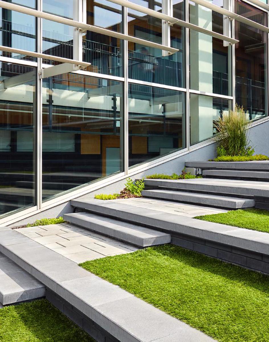 Techo bloc case study commercial paver wall cap grey black west island college main page img1