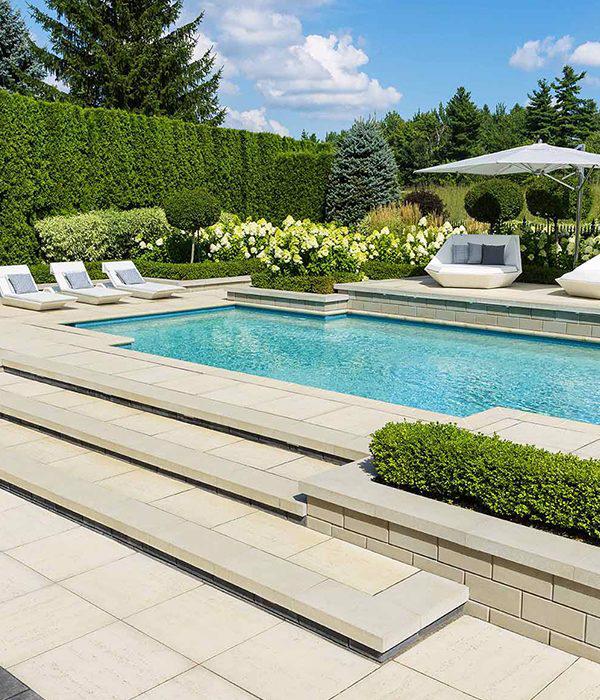 Techo Bloc slabs walls caps backyard patio poolside travertina raffinato ivory beige cream