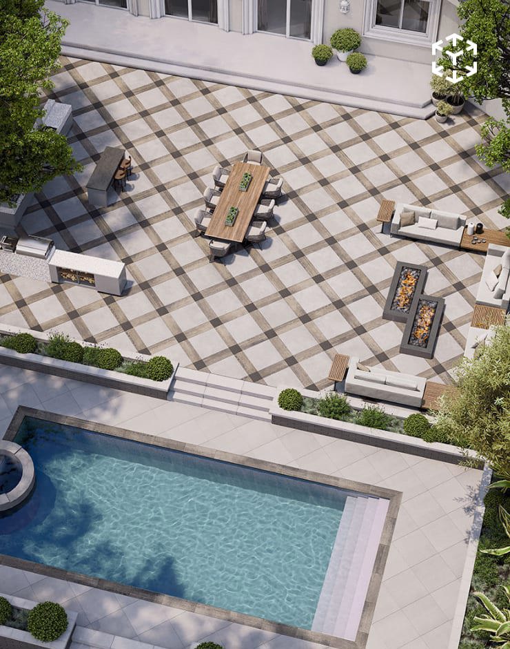 Industria 900 and 300 mosaic pattern forming a large geometric patio beside a pool, with outdoor seating and dining areas.