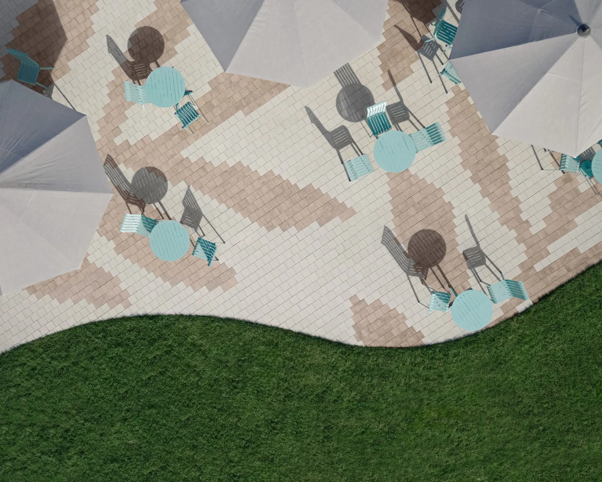 Place du centre communautaire en pavés Industria HD² Granitex de Techo-Bloc avec motifs de feuilles beige et brun, alliant durabilité et design.