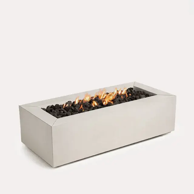 Sculptura Fire Pit Rectangle by Techo-Bloc, sleek rectangular fire pit with lava rock, providing a contemporary outdoor centerpiece for modern spaces.