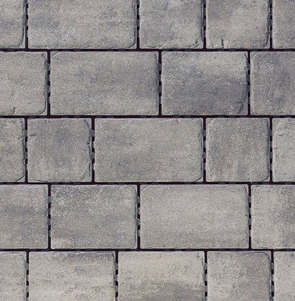 Pavé Pure gris clair avec arêtes chanfreinées, vu en plan rapproché, agencement uniforme.