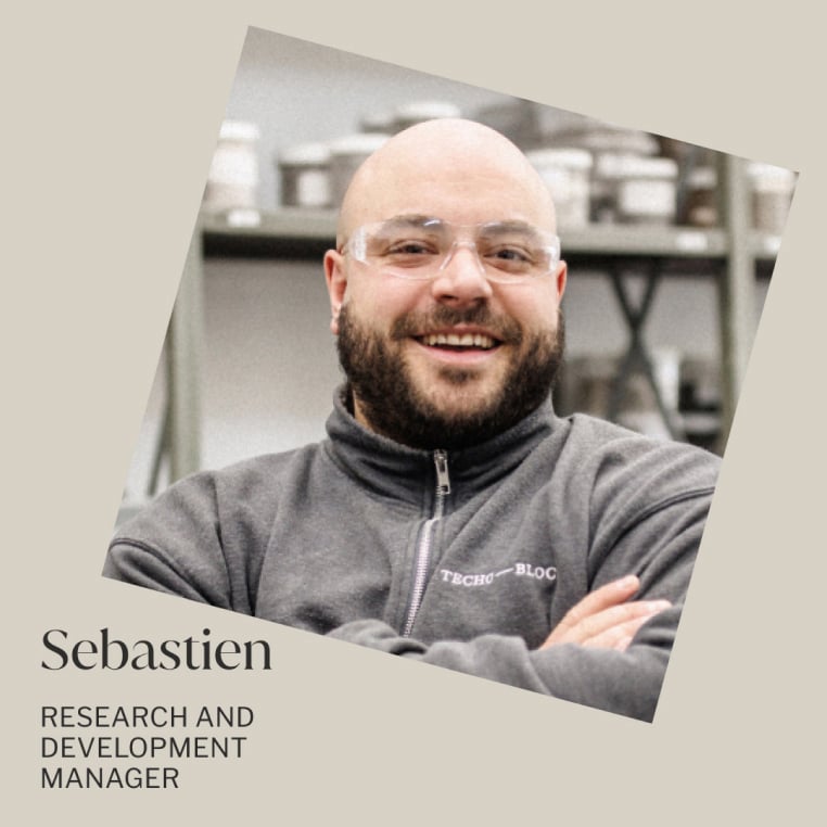 Portrait of Sebastien smiling in a professional setting.