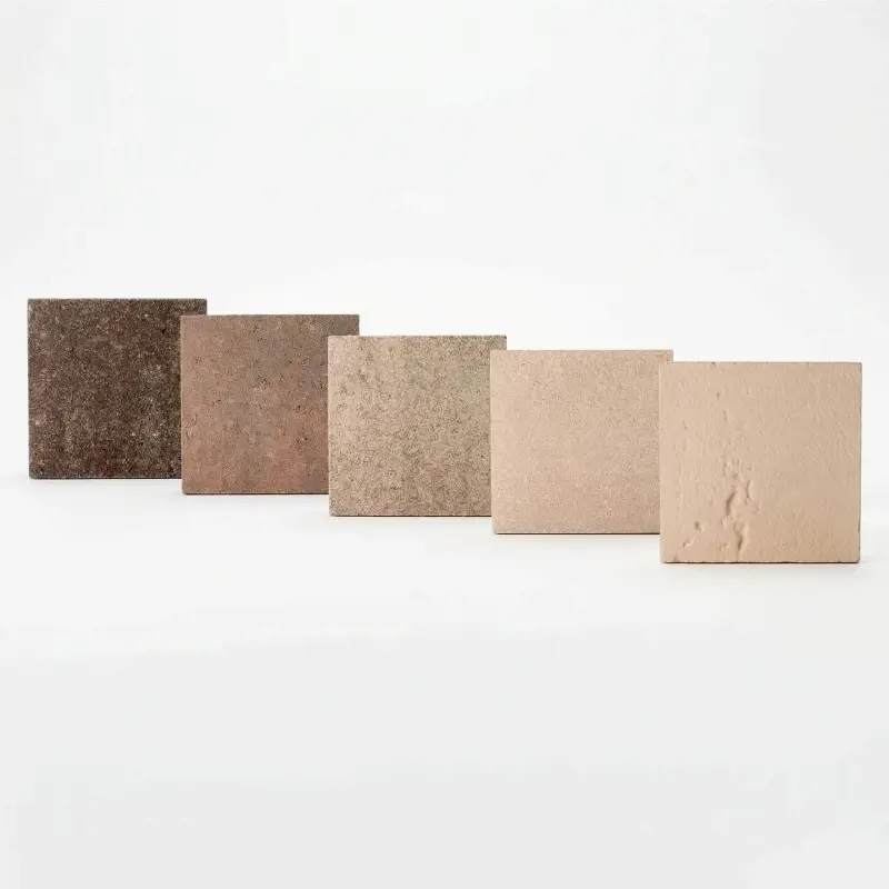 Beige paver sample box with 5 neutral stone textures for outdoor design