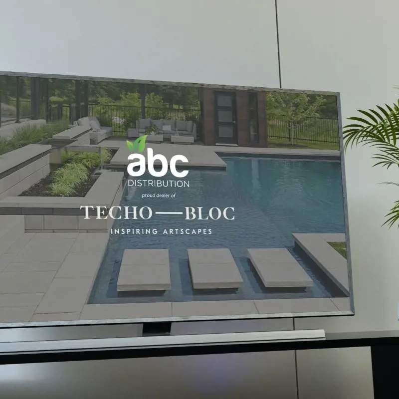 TV ad marketing guidelines with a Techo-Bloc outdoor patio scene on screen.