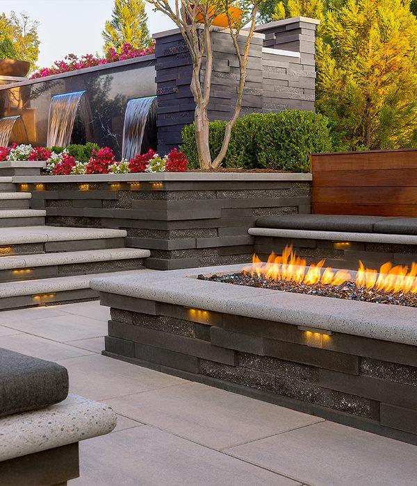 Techo Bloc slabs walls caps backyard patio firepit steps graphix bullnose grande shale grey onyx black greyed nickel