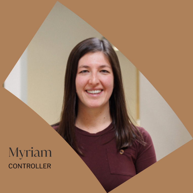 Portrait of Myriam, smiling in a professional office setting.