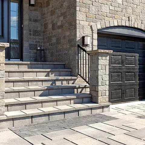 Venetian Smooth Step by Techo-Bloc, smooth concrete overlay steps, providing a modern, sleek finish for outdoor stairs and walkways.