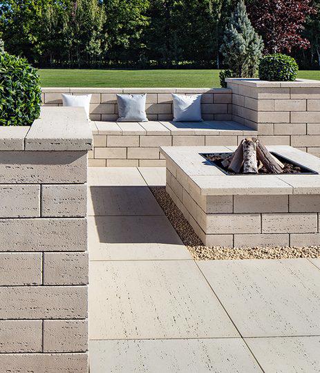 Techo Bloc slabs walls caps backyard patio firepit travertina ivory