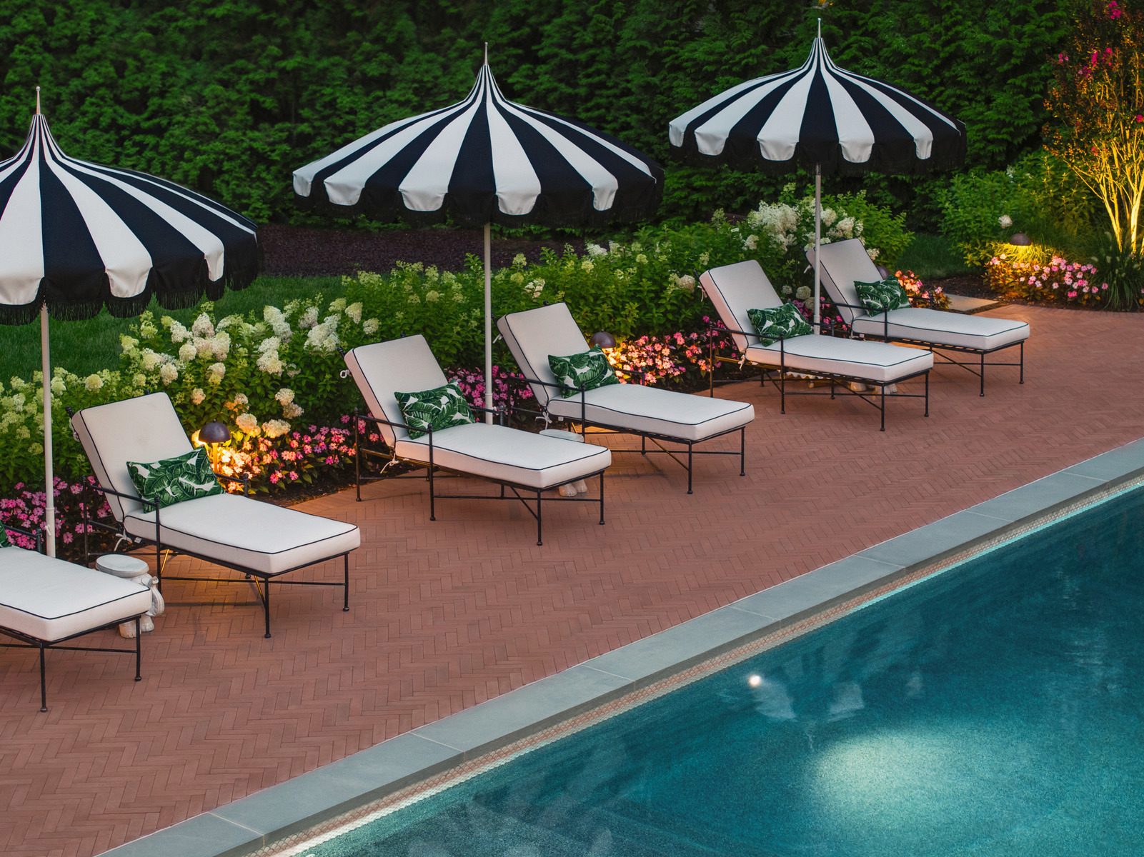 Outdoor furniture, Plant, Water, Property, Umbrella, Flower, Table, Sunlounger, Shade