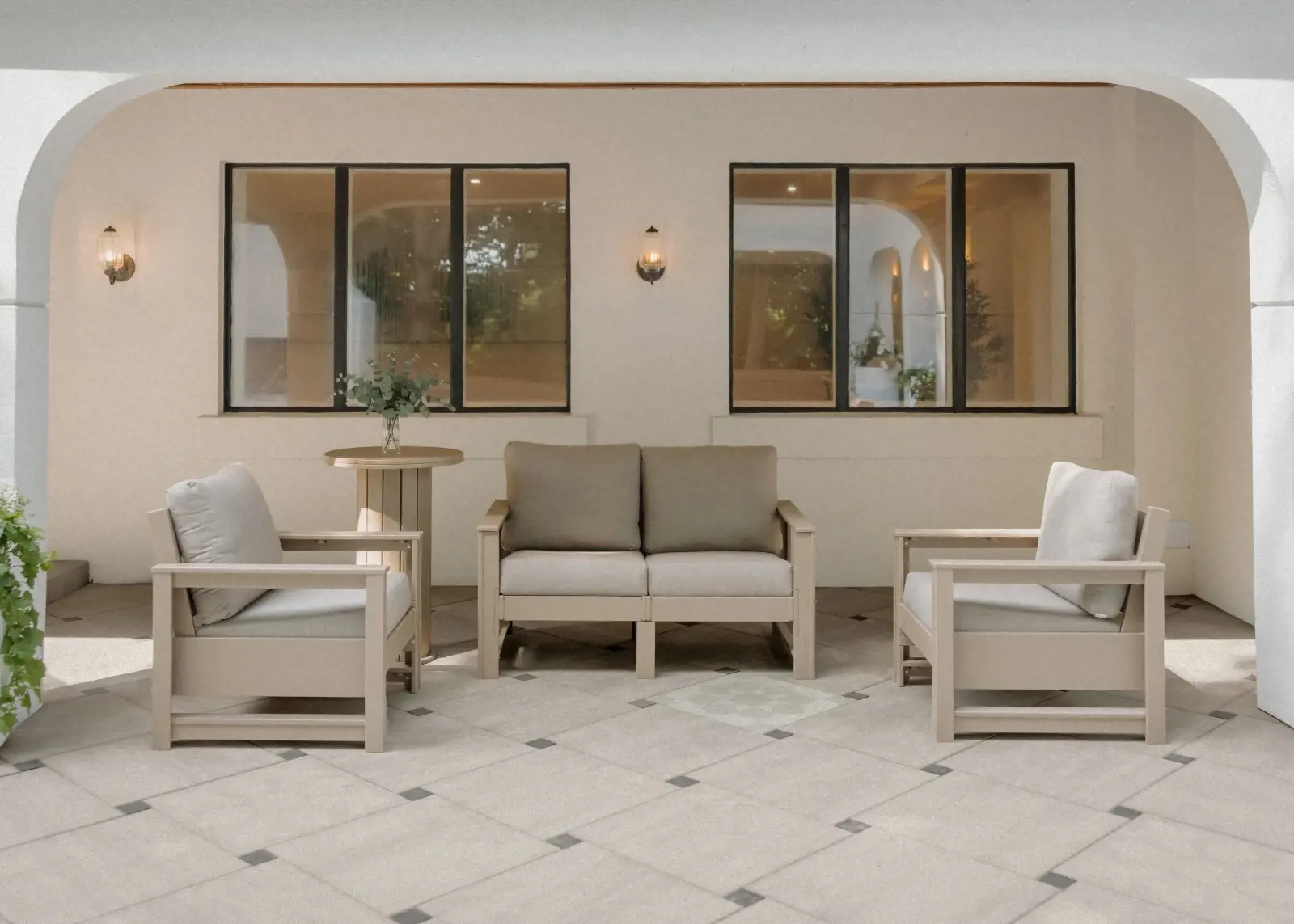 Minimalist outdoor lounge featuring Industria 600×600 slabs in Caffè Crema, creating a soft, seamless foundation with subtle tonal variation.