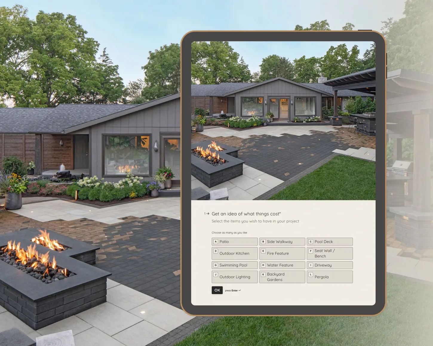 Modern backyard landscaping with Techo-Bloc paving stones, including a fire pit, deck, outdoor kitchen and walkway, displayed on a tablet for an interactive project cost estimate.