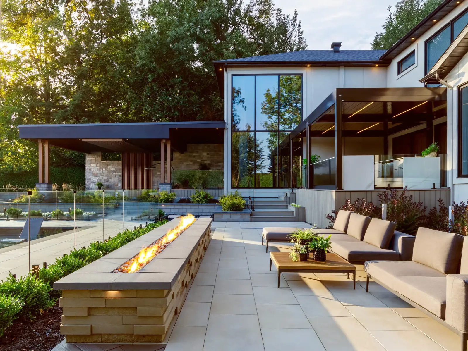 Outdoor seating and lounge area built with Graphix Walls in Beige Cream for a sleek architectural look.