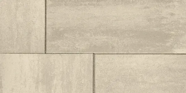 Gros plan sur des dalles grand format Para de Techo-Bloc, avec finition lisse HD² et joints serrés, offrant une apparence de béton moderne dans des tons beiges doux.