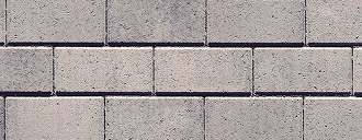 Close-up of Victorien paver by Techo-Bloc in grey, showing linear pattern and tight joint alignment.