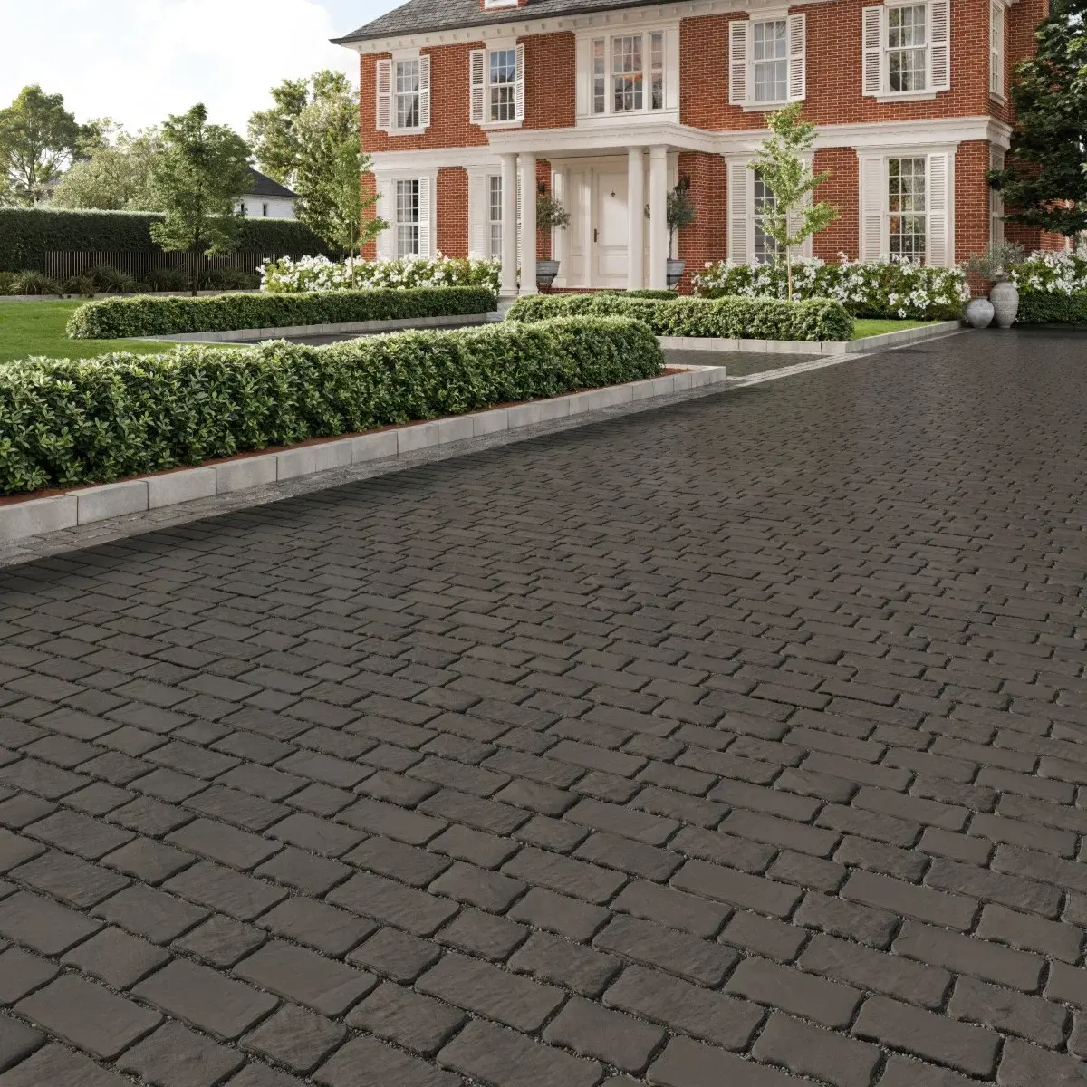 Saint-Oxford Paver by Techo-Bloc in Onyx Black with slate texture, laid in a linear pattern for a bold and timeless driveway look.