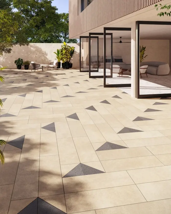 Modern patio with Techo-Bloc Industria pavers in neutral tones, laid in clean linear pattern.