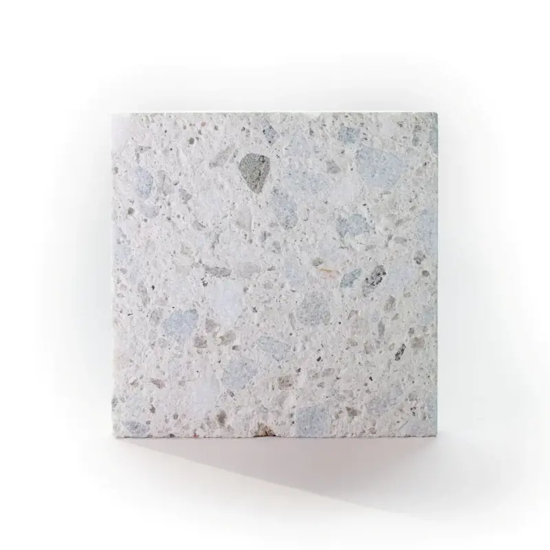 Terrazzo Sample patio slab in Mineral White with subtle aggregate pattern and light modern finish