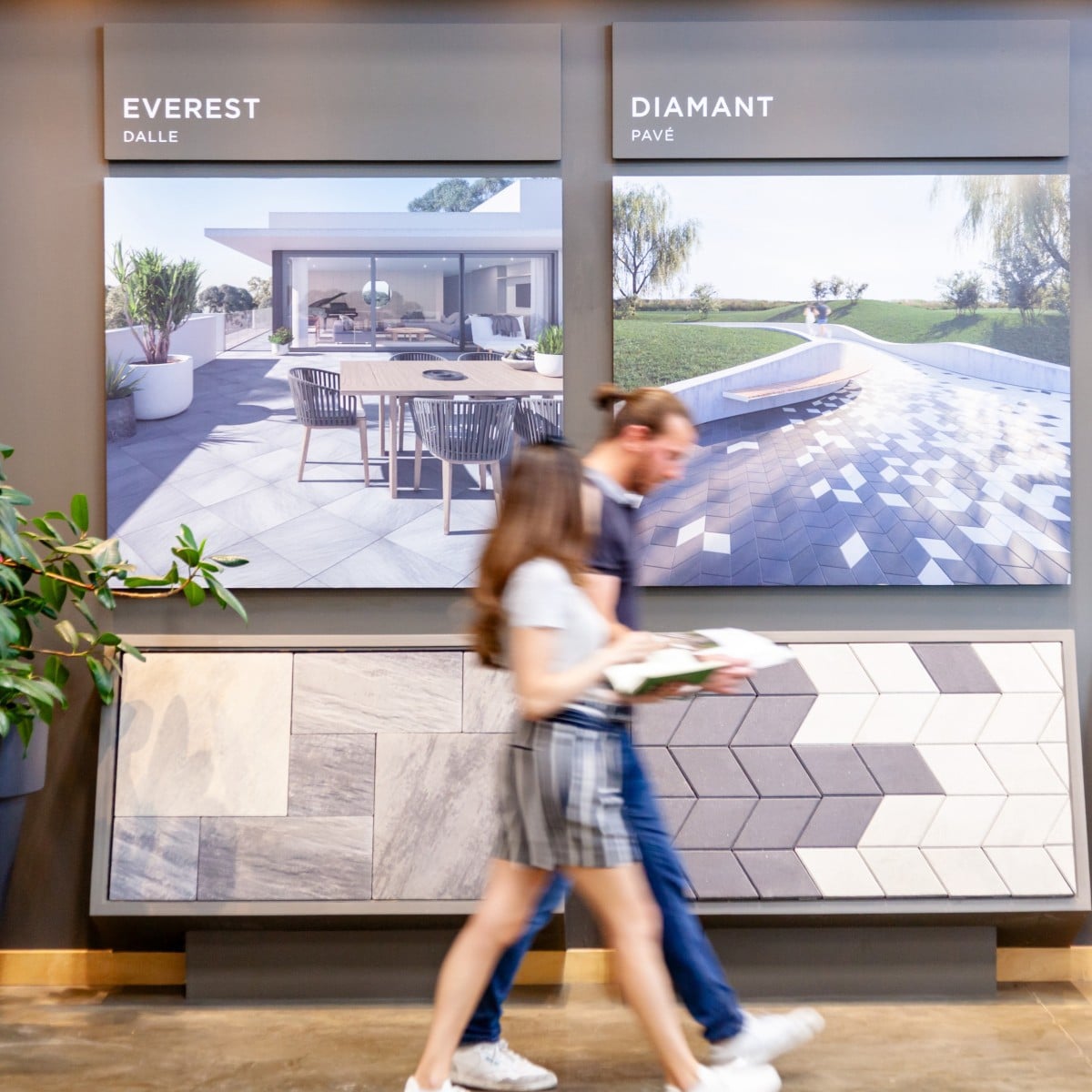 Dealership showroom display featuring Everest and Diamond paver samples.