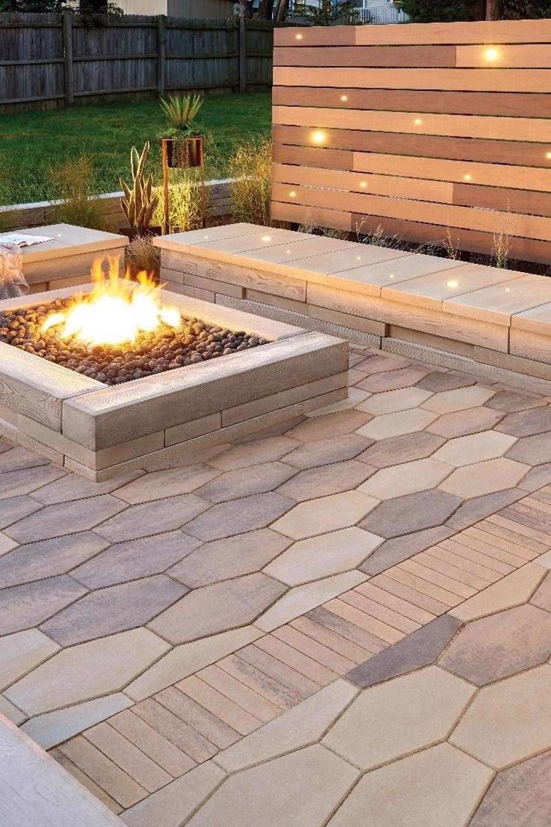 Elegant lighting features fire pit