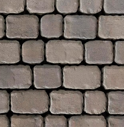 Pavés Villagio à l’aspect vieilli avec bords usés, rappelant les pavés anciens.