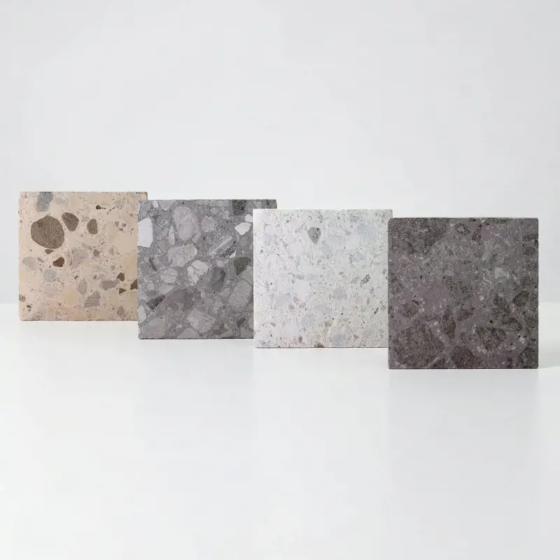Terrazzo paver sample box with bold aggregate textures for modern outdoor spaces