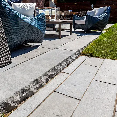 York Step by Techo-Bloc, smooth surface with rough carved edges, ideal for creating durable, functional outdoor stairs with a modern look.