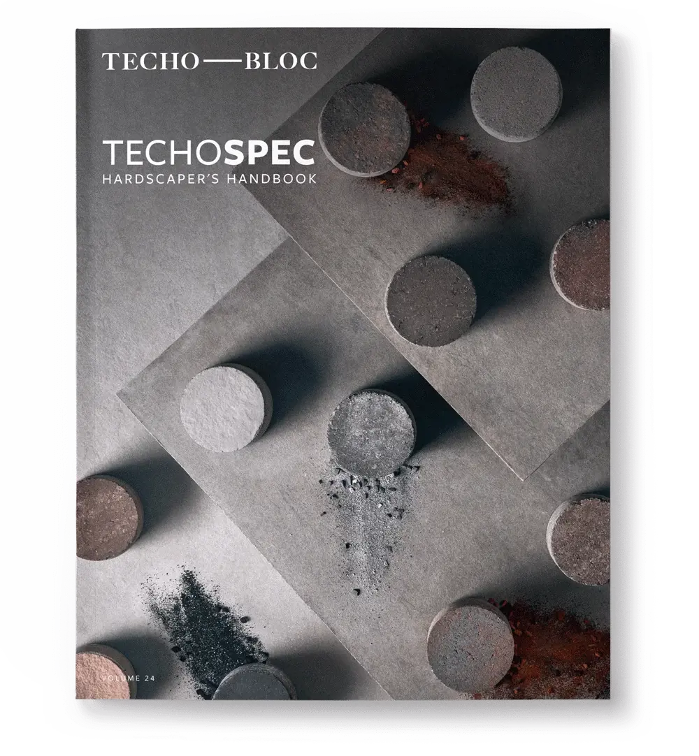 Cover of the Techo-Bloc specification handbook showing textured material samples arranged in a graphic layout.