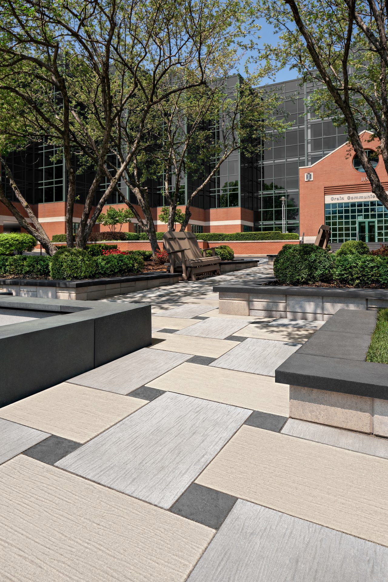 Close up of courtyard floor using Techo-Bloc's Ocean Grande Slab and Valet Paver.