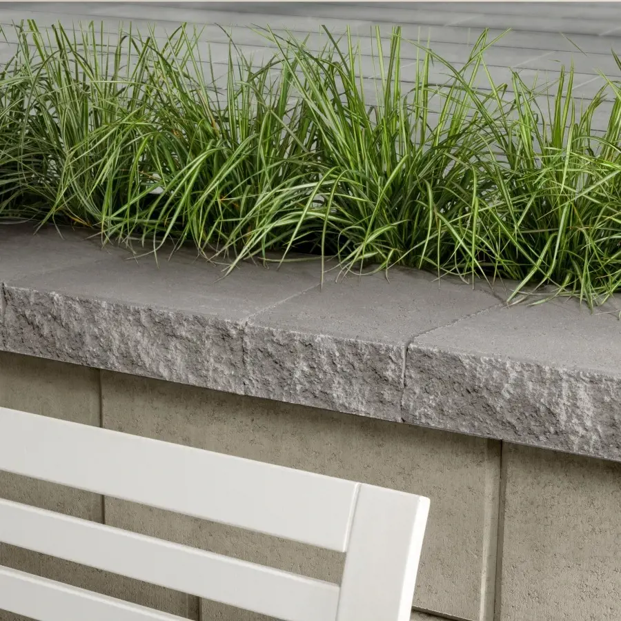 Couronnement Architectural par Techo-Bloc en Nickel Grisé, posé sur muret avec profil lisse et moderne.