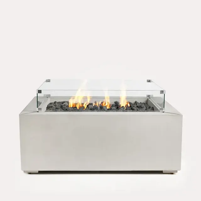 Sculptura Fire Pit Square by Techo-Bloc, sleek square fire pit with glass surround and lava rock, perfect for creating a modern outdoor focal point.