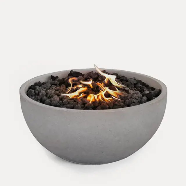 Sculptura Lumi Firebowl Kit by Techo-Bloc, firebowl with an antique Warm Grey finish, including a stainless-steel burner, lava rock, and fabric cover.