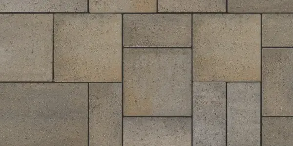 Gros plan sur les pavés Eva Lisse de Techo-Bloc en Gris Champlain, affichant un motif modulaire net et une finition lisse et classique.
