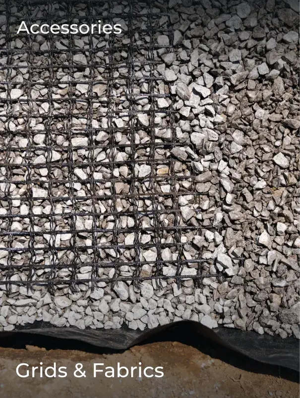 Ground grid and fabric installed beneath a layer of gravel—used to reinforce and stabilize landscaping base layers.