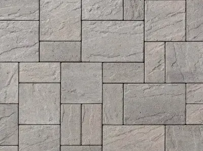 Eva Slate Paver by Techo-Bloc shown from above, with a slate-textured surface and geometric joint layout.