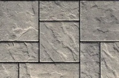 Blu 80 Slate paver by Techo-Bloc in Shale Grey, shown in a classic modular pattern for patios.