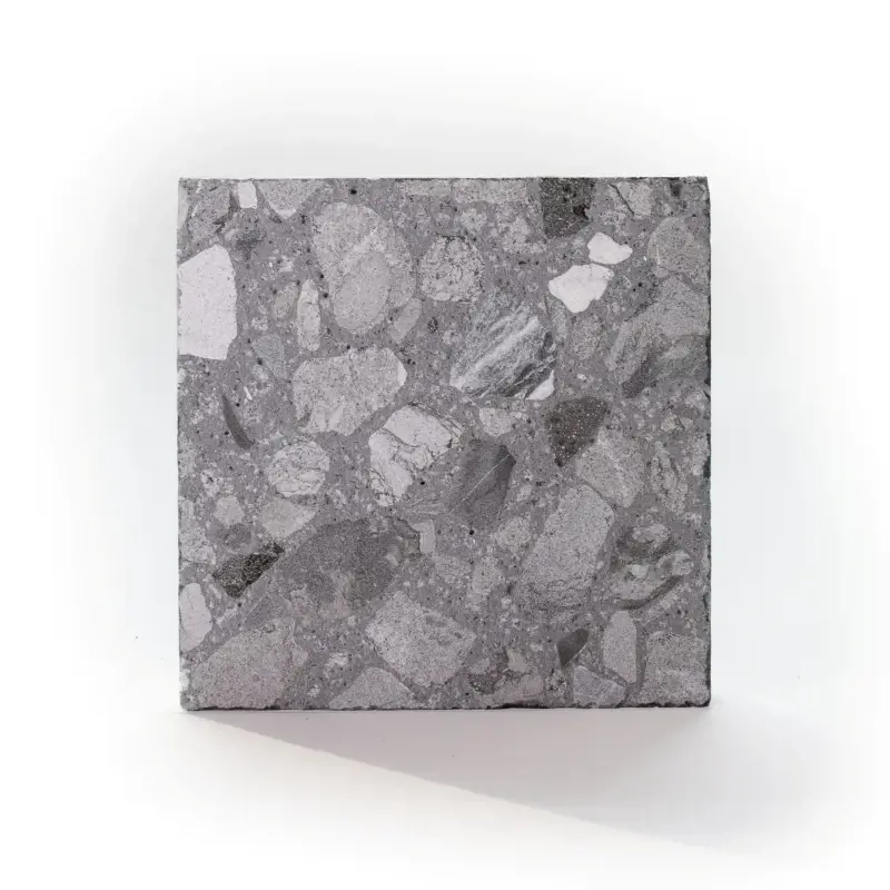 Terrazzo Sample patio slab in Moonrock Grey with mixed grey stone aggregates and textured finish