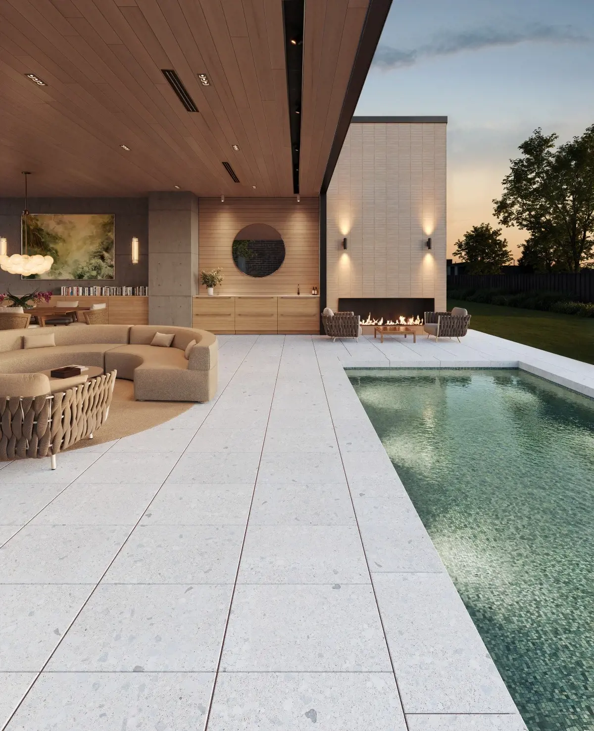 Espace de vie extérieur au bord de la piscine avec couronnements terrazzo Techo-Bloc utilisés comme bord de piscine pour une finition harmonieuse