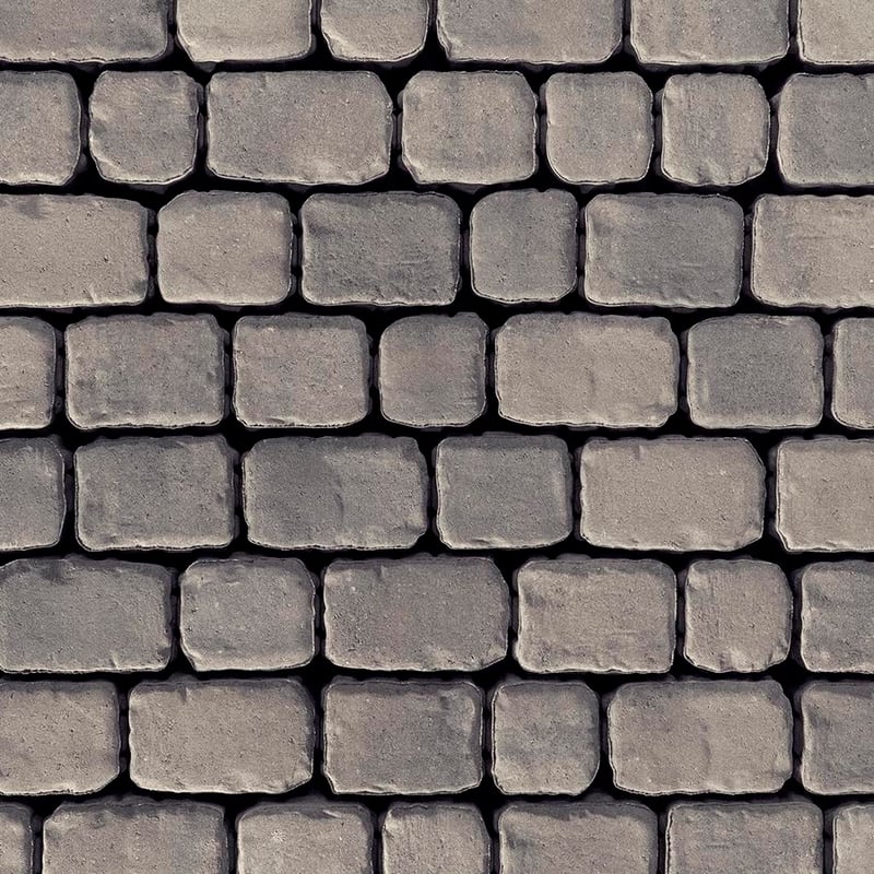 Techo-Bloc Villagio Paver Shale Grey with beveled edges, close-up of aged cobblestone surface in soft grey hues.