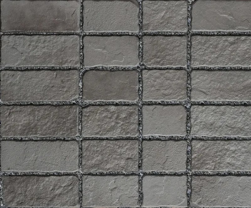 Techo-Bloc Oxford Paver Midnight Grey with a textured surface, offering a stylish, rustic finish for outdoor driveways or patios.