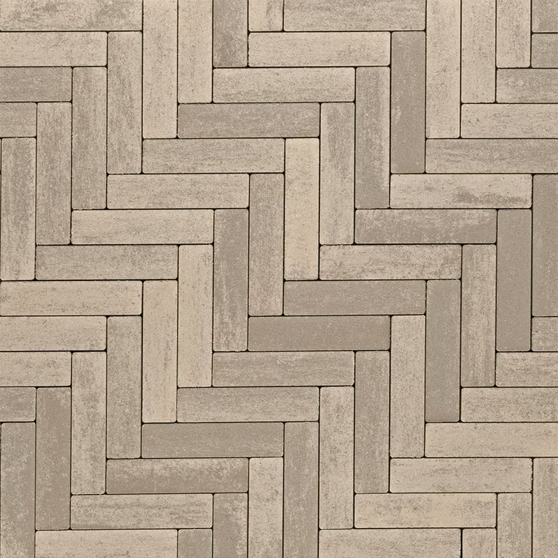 Techo-Bloc Westmount Paver Caffe Crema with smooth texture, laid in Herringbone Pattern for a refined, intricate surface.