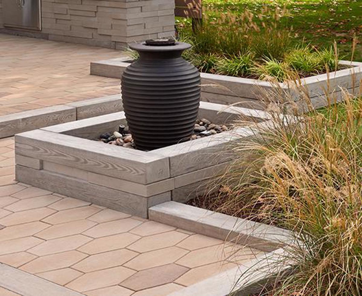 Techo bloc homepage co backyard patio slabs water feature beige brown mosaic img4