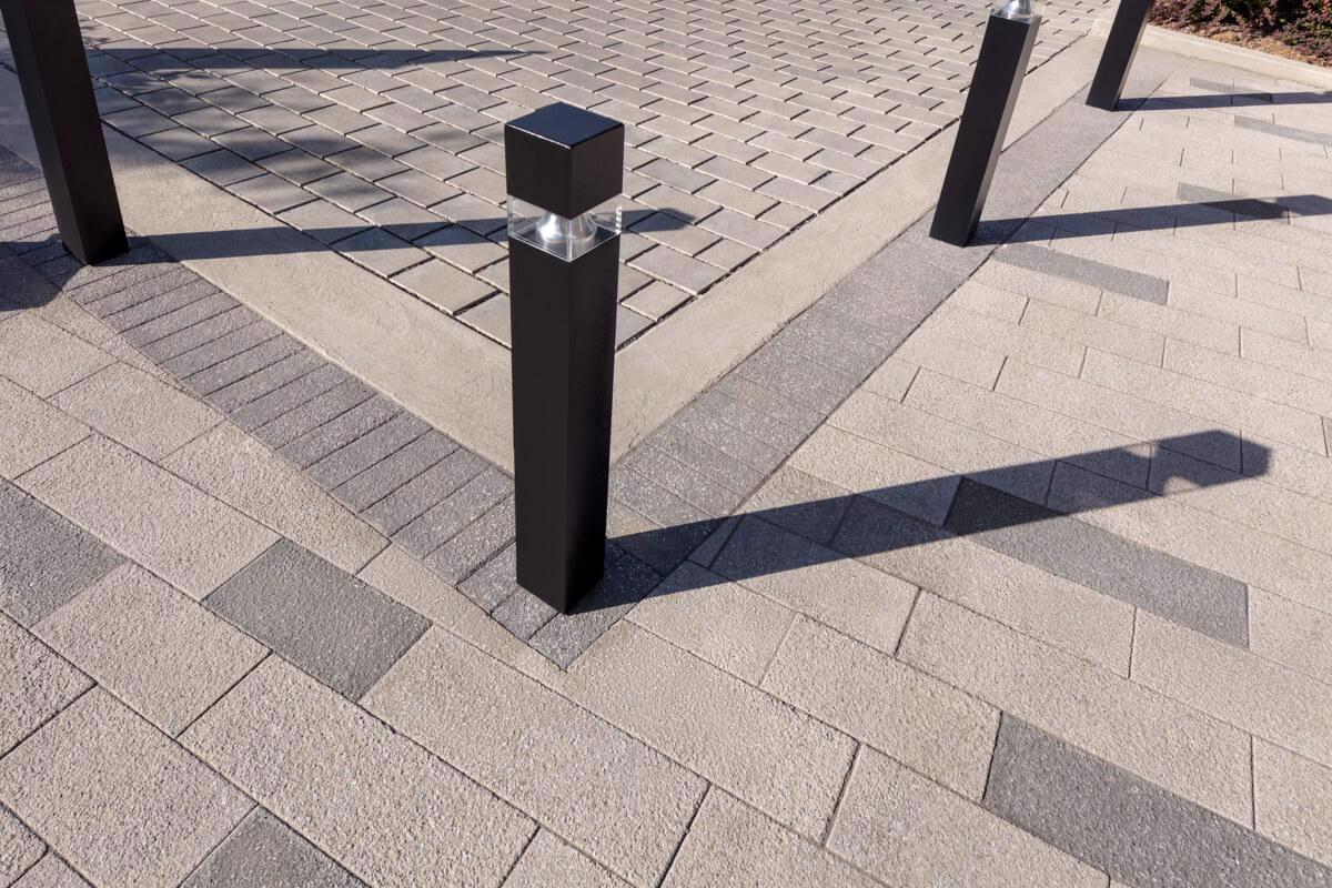Techo bloc case study commercial permeable paver grey black myst condo img1